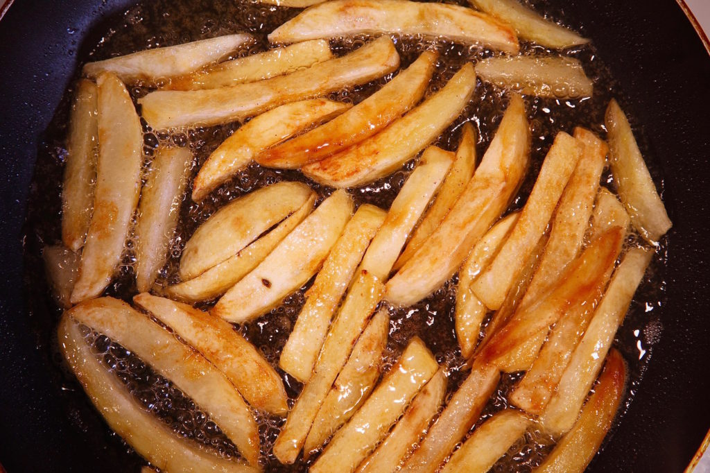 Idaho Potato french fries frying to a crisp