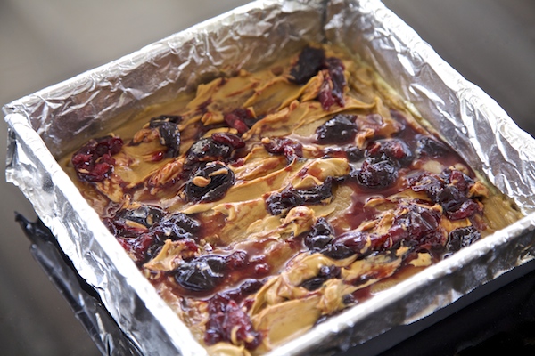 peanut butter and cherry mix swirled together