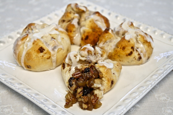 Apple raisins cinnamon knots topped with sweetened condensed milk