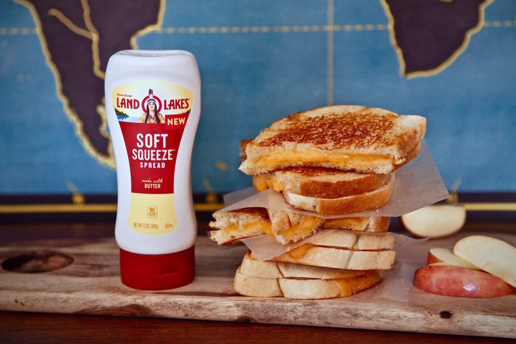 Find all your ingredients at Walmart for Easiest Crispy Grilled Cheese Sandwich With New Land O' Lakes Soft Squeeze Spread
