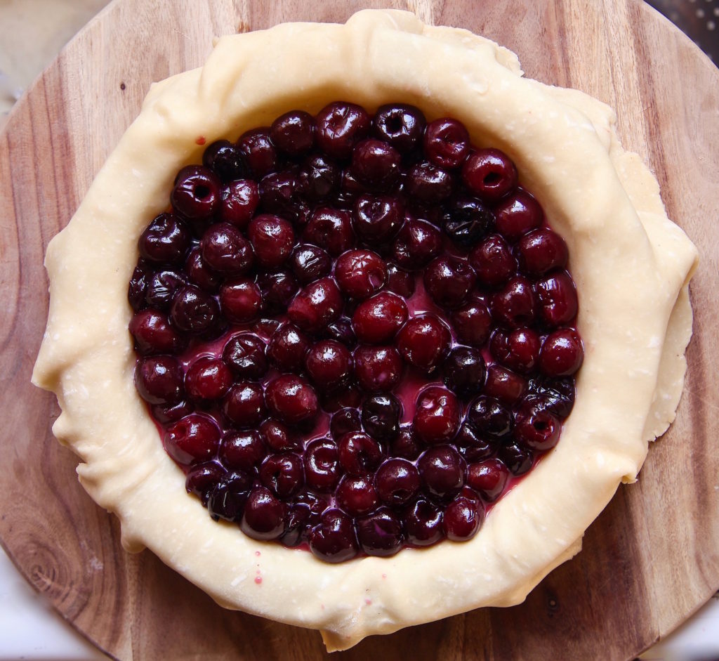 Inside the best dark sweet cherry pie, before the second crust got planted on top. 